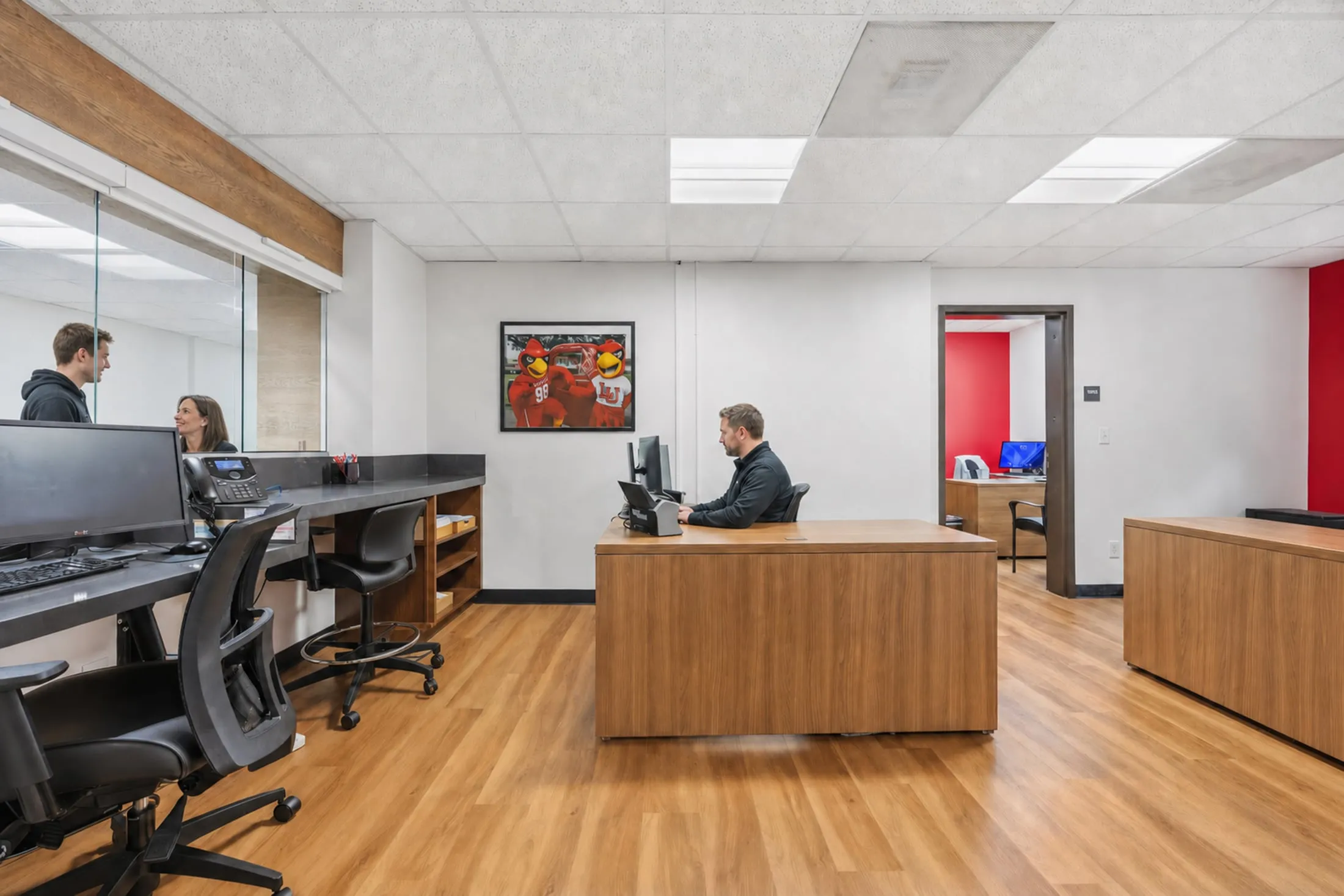 Staff office with mascot artwork at the Lamar University Wimberly Registrar Office